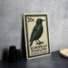 A metal stamp featuring a black and white illustration of a bird, with text indicating it is a European starling.