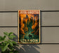 A vintage-style poster of Jeita Grotto, a famous cave system in Lebanon, is displayed on a wall next to a plant.