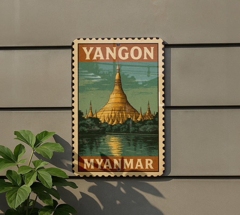 A vintage-style sign with the word "YANGON" and a depiction of the Shwedagon Pagoda, a famous Buddhist temple in Yangon, Myanmar.