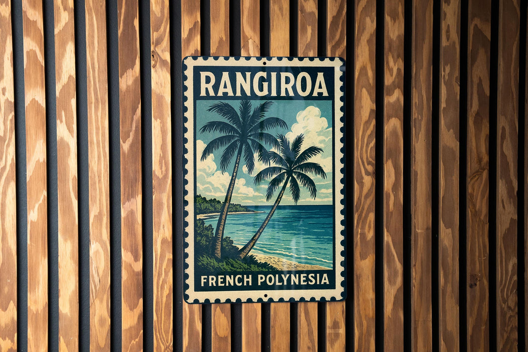 A vintage-style metal sign with a tropical beach scene and palm trees, mounted on a wooden wall.