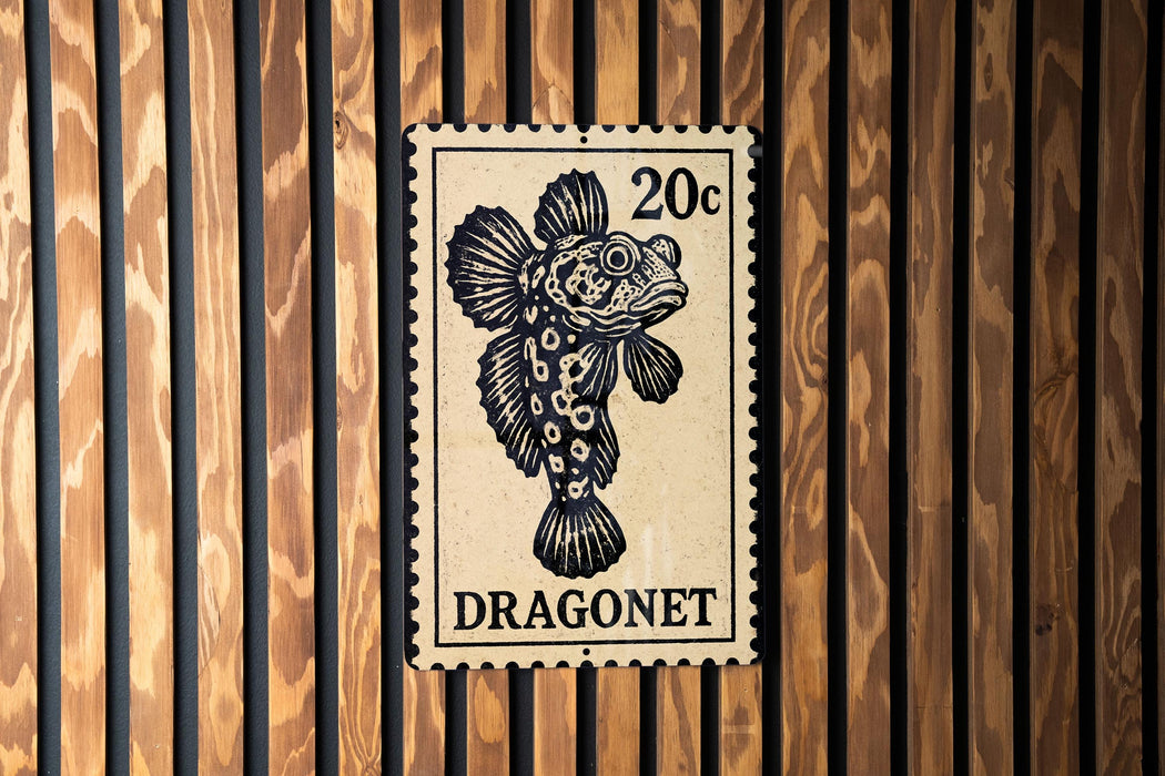 A 20 cent stamp featuring a dragon fish, with the word "Dragonet" printed below it.