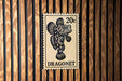 A 20 cent stamp featuring a dragon fish, with the word "Dragonet" printed below it.