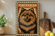 A framed illustration of a Pomeranian dog is displayed on a shelf, accompanied by a wooden cutting board and a potted plant.
