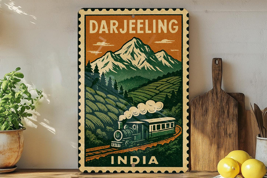 A vintage-style poster of a train traveling through a mountainous landscape, with the text "DARJEELING INDIA" prominently displayed.