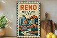 a vintage-style metal sign with the text " Reno Nevada USA" displayed prominently. The sign is placed on a wooden surface, with a potted plant to the left and a wooden cutting board to the right. There are also some lemons and a knife visible in the image.