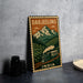 A vintage-style metal sign with a train and mountains in the background, depicting the scenic Darjeeling region in India.