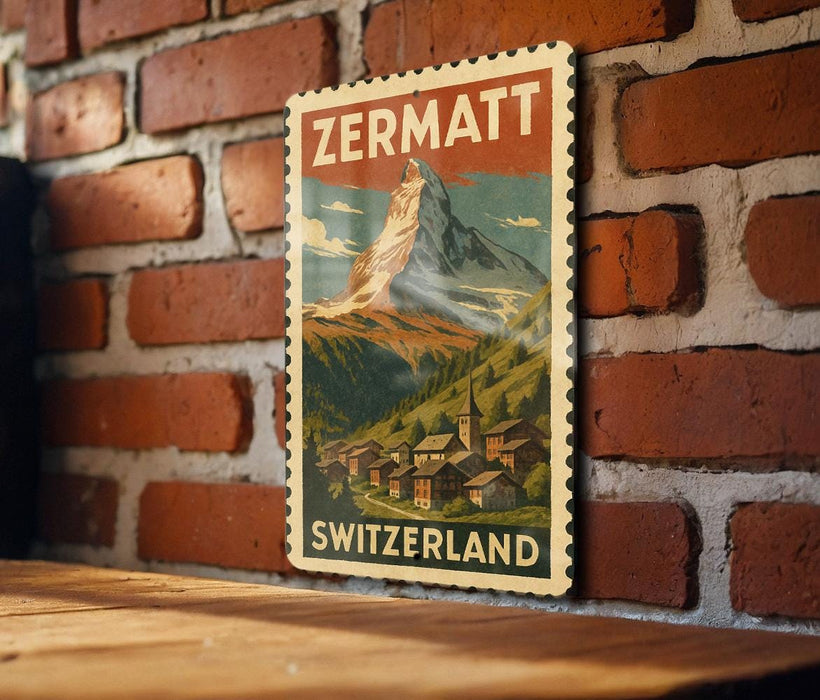 A vintage-style poster of the Swiss mountain range, featuring the word "ZERMATT" prominently displayed.