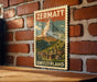 A vintage-style poster of the Swiss mountain range, featuring the word "ZERMATT" prominently displayed.