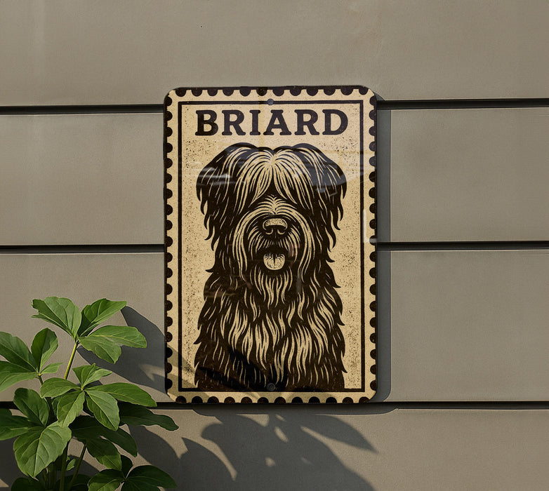 a decorative metal sign with a stylized illustration of a dog's face, mounted on a wall.
