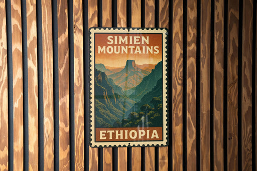 A vintage-style metal sign with the text "SIMIEN MOUNTAINS" and "ETHIOPIA" displayed on a wooden wall.