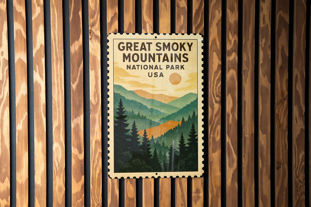 A vintage-style postage stamp featuring a scenic mountain landscape with pine trees and a sun in the sky, mounted on a wooden wall.