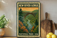 A vintage-style metal sign for New River Gorge National Park, featuring a scenic illustration of a bridge over a river surrounded by autumn foliage.