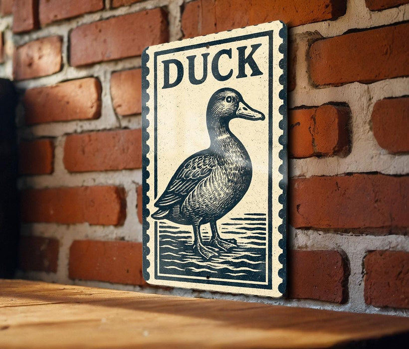 A sign featuring a duck is mounted on a brick wall.