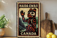 A metal sign with a colorful illustration of a Native American symbol, surrounded by text that reads "HAIDA GWAAII CANADA".