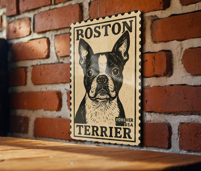 A vintage-style metal sign featuring a black and white illustration of a Boston Terrier dog, mounted on a brick wall.