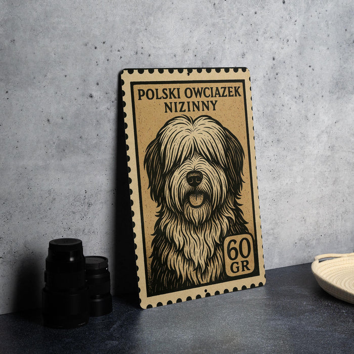 A metal sign featuring a stylized illustration of a dog's face, with text indicating it is a Polish Owciazek Niziny.