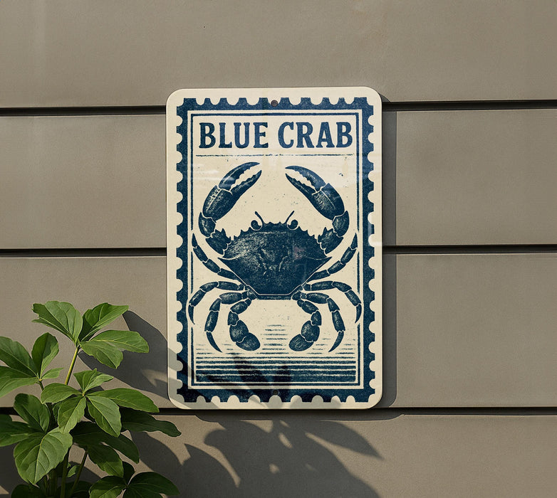 a sign with a blue crab illustration on it, mounted on a wall.