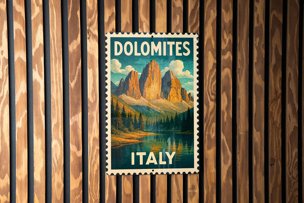 A vintage-style poster of Dolomites, a famous mountain range in Italy, is displayed on a wooden wall.