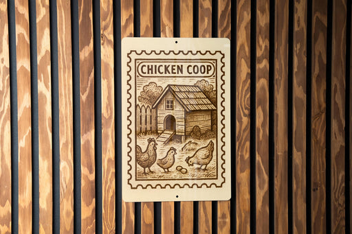 A sign with a wooden background and a stamp-like design, featuring a house and chickens, mounted on a wooden wall.