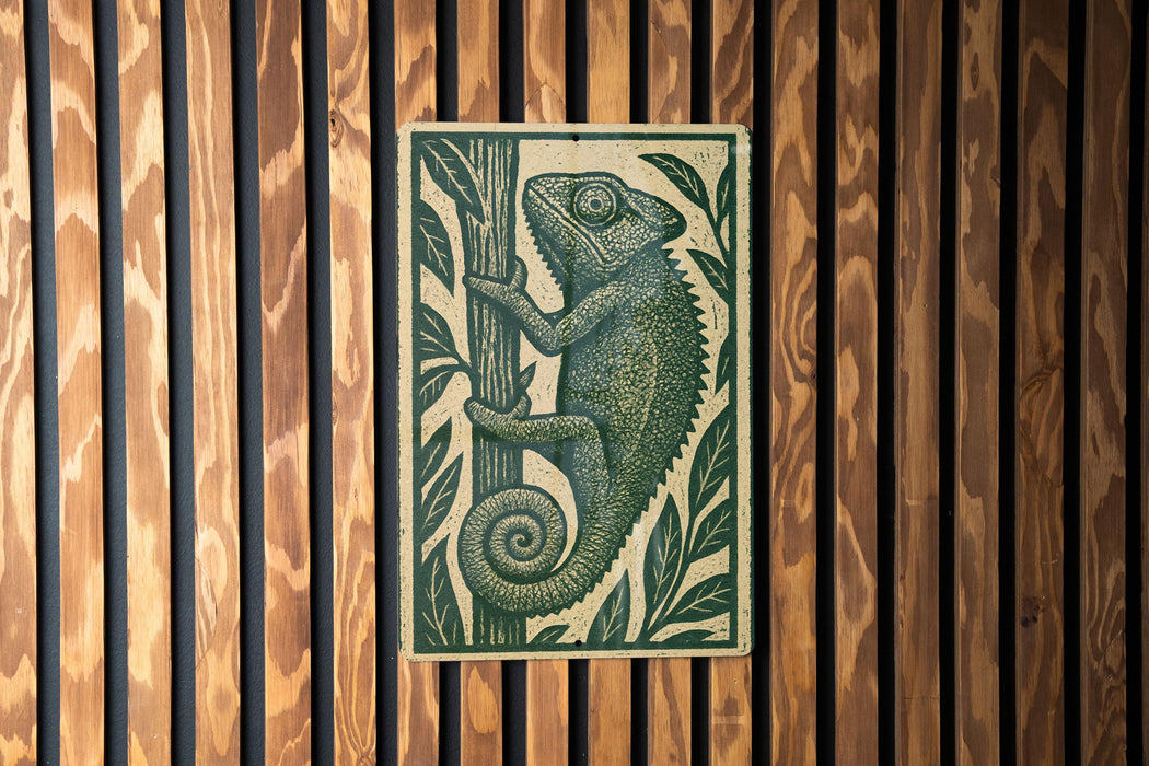 a chameleon, a type of lizard, on a wooden surface.
