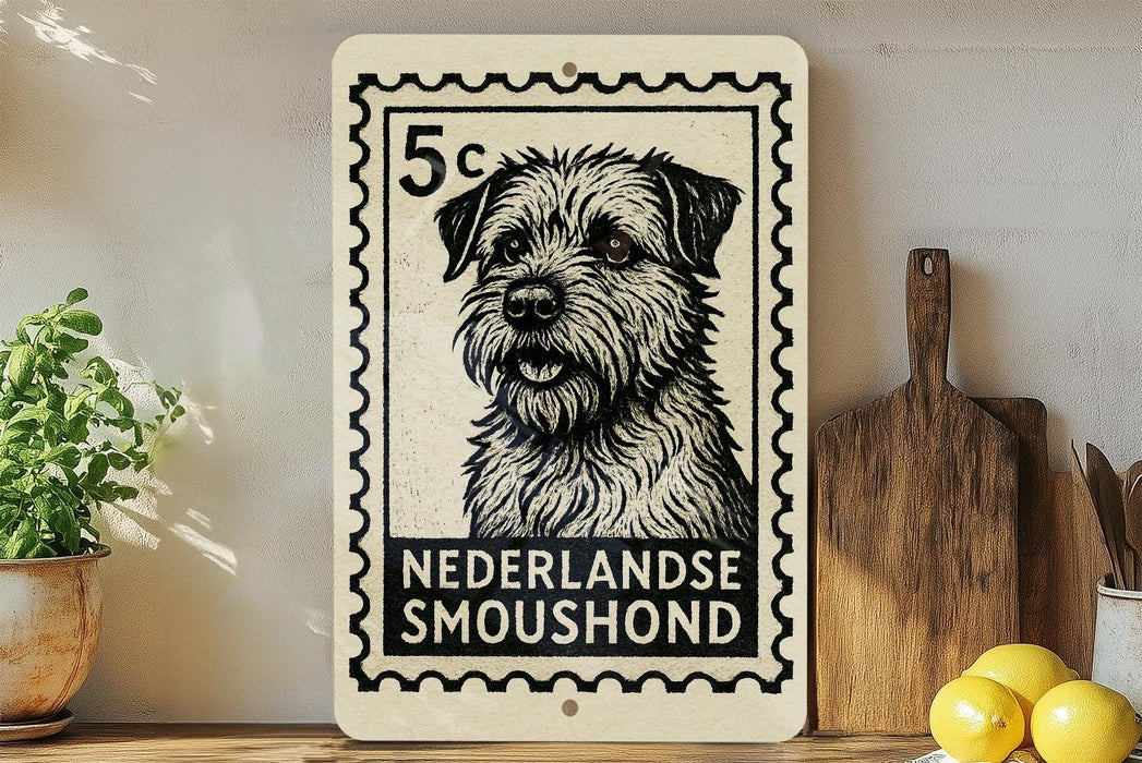 A black and white illustration of a dog, likely a breed from the Netherlands, is displayed on a white postcard-like frame. The frame is placed on a wooden surface, with a potted plant, a wooden cutting board, and some lemons nearby.