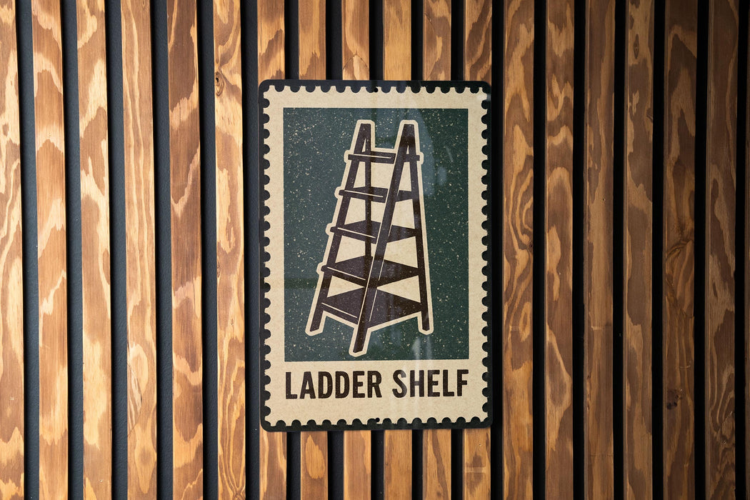A sign with a ladder on it is mounted on a wooden wall.