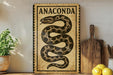 a wooden sign with a snake design, placed on a shelf next to a wooden cutting board and some lemons.