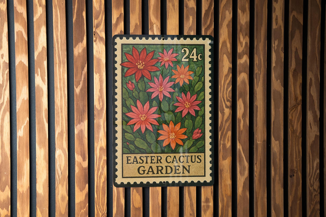 A postage stamp featuring a vibrant illustration of a cactus garden, with the text "EASTER CACTUS GARDEN" printed on it.