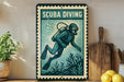 A vintage-style metal sign with a scuba diver illustration, placed on a wooden shelf next to a potted plant and a wooden cutting board.