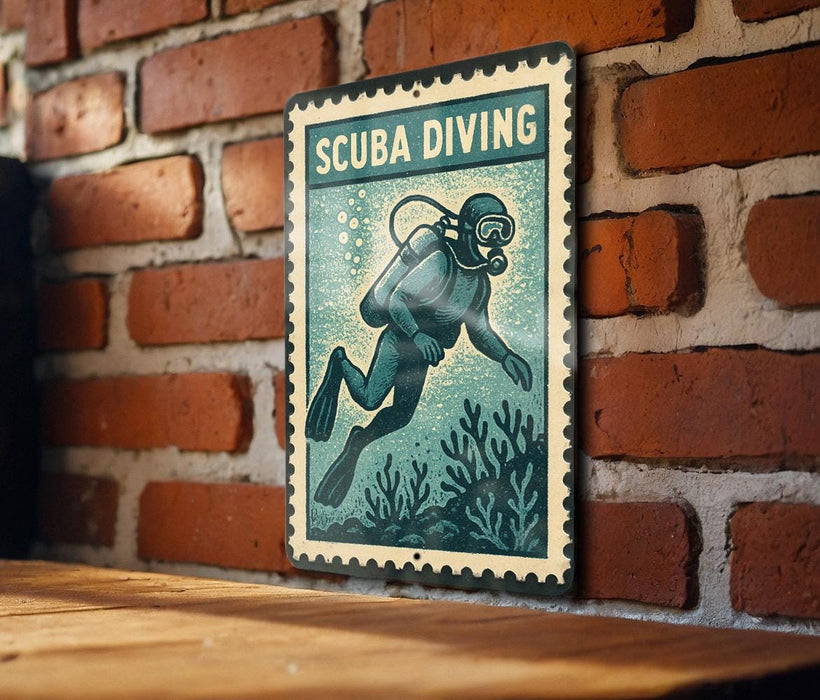 A vintage-style metal sign with a scuba diver illustration is mounted on a brick wall.