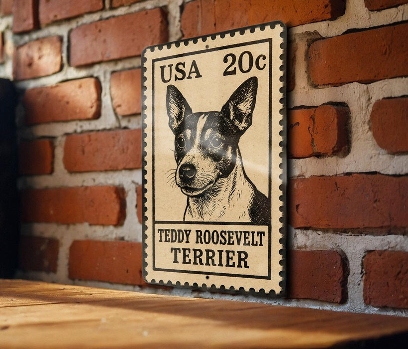 A vintage-style metal sign featuring a black and white illustration of a Teddy Roosevelt Terrier dog, mounted on a brick wall.