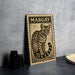 a framed illustration of a leopard, with the name "Margay" written above it.