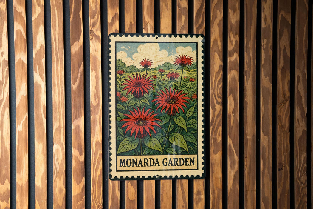 A vintage-style metal sign with a floral illustration of red flowers and green leaves, mounted on a wooden wall.