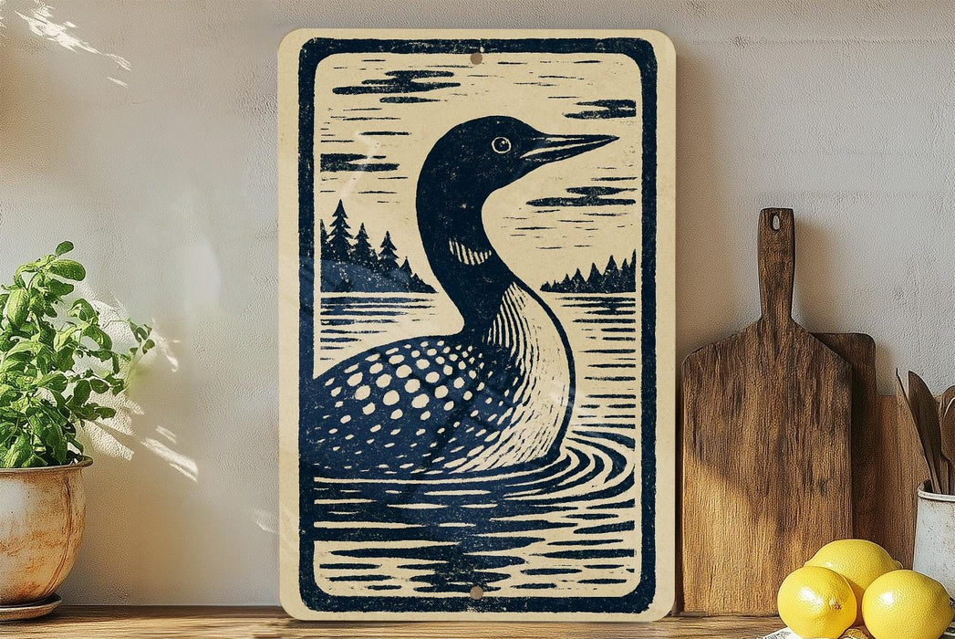 a wooden sign with a black and white illustration of a loon swimming in a lake, surrounded by trees and a cloudy sky.