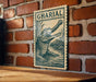 A wooden table with a large, ornate, and detailed crocodile stamp or sign hanging on a brick wall.