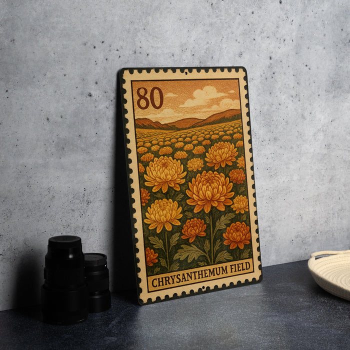 A metal stamp depicting a field of chrysanthemum flowers, with the number 80 printed on it.