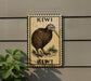 a kiwi bird, a large flightless bird native to New Zealand, depicted on a sign with the word "Kiwi" written below it.