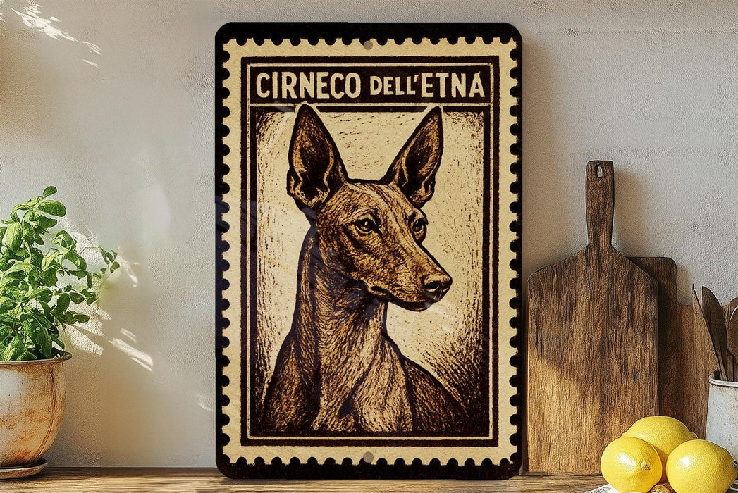 a framed print of a dog, specifically a Ciroco dell' espresso dog, on a shelf.