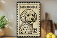 A framed image of a Dalmatian dog, with the text "DALMADOoodle" and the number "32" printed on it, is displayed on a shelf next to a wooden cutting board and some kitchen utensils.