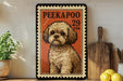 A framed illustration of a small dog, likely a Pekingese, is displayed on a shelf next to a wooden cutting board and some lemons.