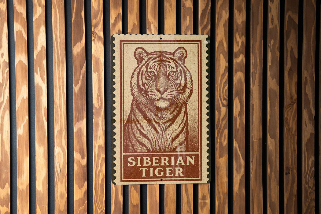 A sign featuring a tiger's portrait is mounted on a wooden wall.