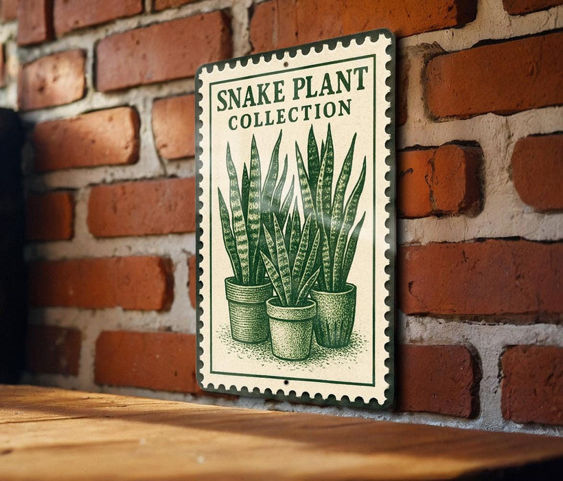 A metal sign with a snake plant illustration is mounted on a brick wall.