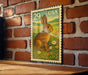A wooden table with a brick wall in the background, and a framed image of a rabbit on the wall.