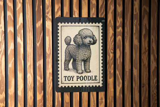 A sign featuring a poodle illustration and the text "TOY POODLE" is displayed on a wooden wall.