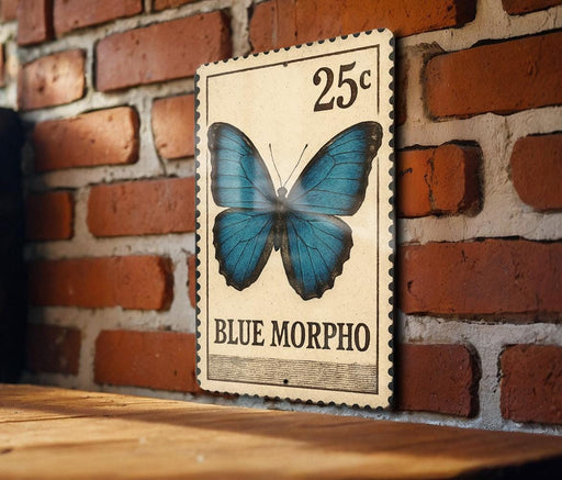 A 25c postage stamp featuring a blue butterfly is displayed on a brick wall.
