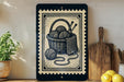 a black and white illustration of a basket filled with balls of yarn, accompanied by knitting needles, placed on a shelf next to a wooden cutting board and a potted plant.