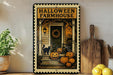 A Halloween-themed metal sign with a porch, pumpkins, and a cat, displayed on a shelf next to a wooden cutting board and a potted plant.