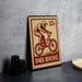 A vintage-style stamp depicting a BMX biker, with the text "BMX Biking" printed on it.