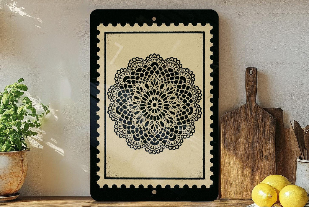 a framed black and white floral design on a shelf, with a wooden cutting board and a potted plant nearby.