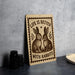 a sign with the text "LIFE IS BETTER WITH RABBITS" and an illustration of two rabbits.